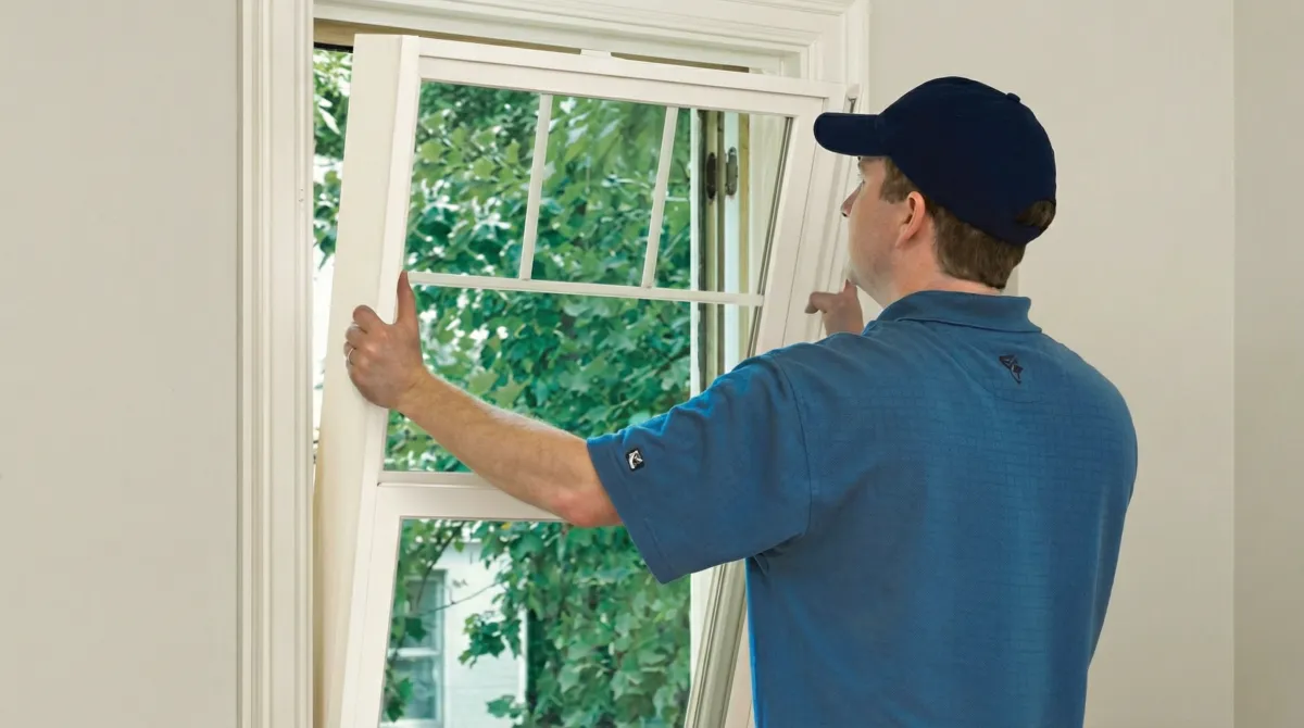 Professional contractors performing a residential window insulation and replacement service in Yonkers, NY